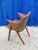 Beautifully crafted Danish modern armchair featuring a sculptural solid teak frame and genuine leather upholstery. The...