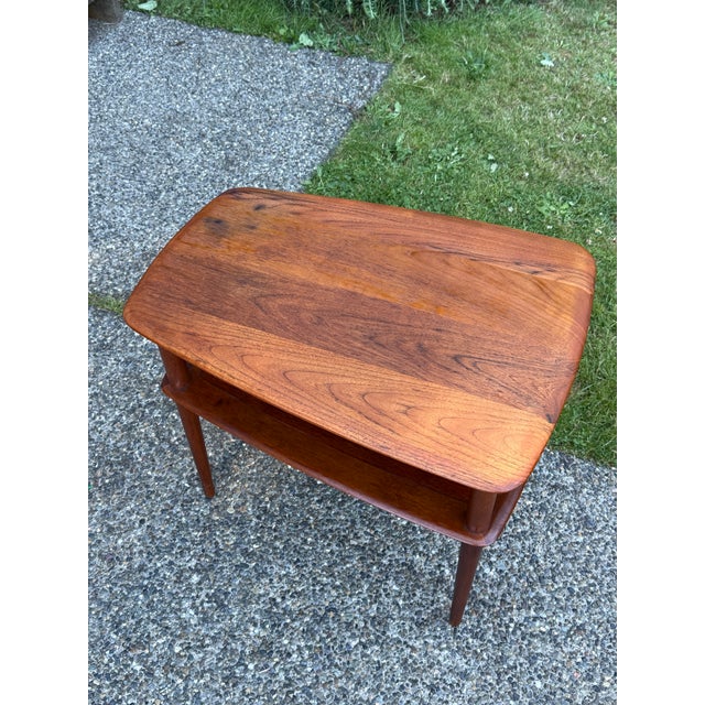 Mid century modern danish Solid Teak Side Table by Peter Hvidt Mid-century solid teak side table designed by Peter Hvidt &...