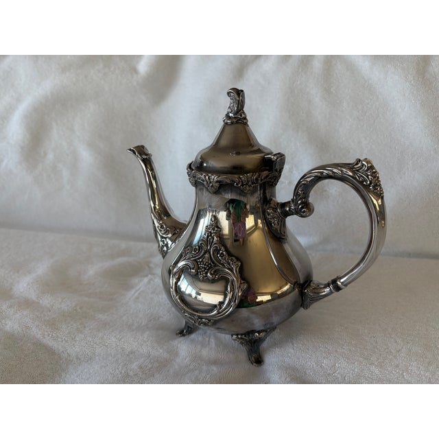 Old world charm and elegance define this Webster and Wilcox Silverplate Tea Set! An intricate pattern decorates each piece...