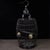 This is a substantial and exquisitely crafted wooden birdcage, featuring an elegant, barrel-shaped body and a domed top....