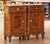 Decorate a bedroom with this elegant pair of antique nightstands. Crafted in France circa 1890, each cabinet is built of...