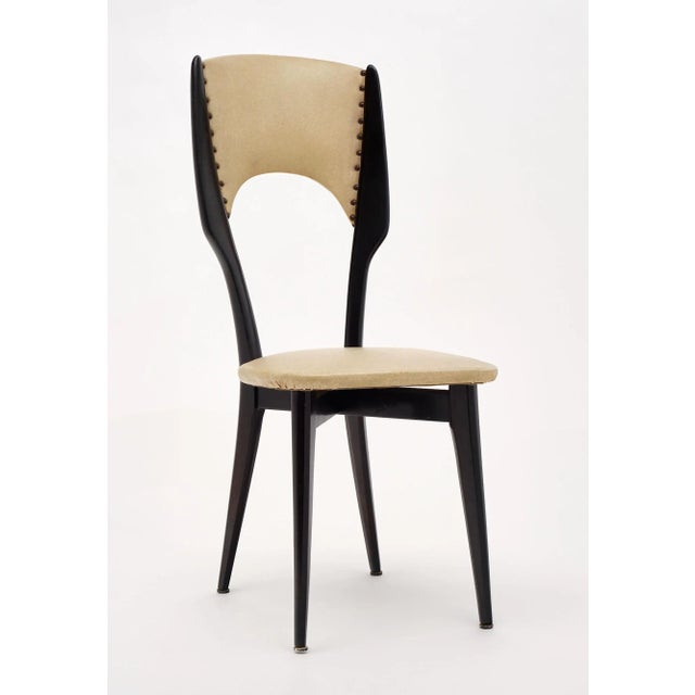 Set of six dining chairs from Italy attributed to Carlo di Carli. They are made of mahogany that has been ebonized and...