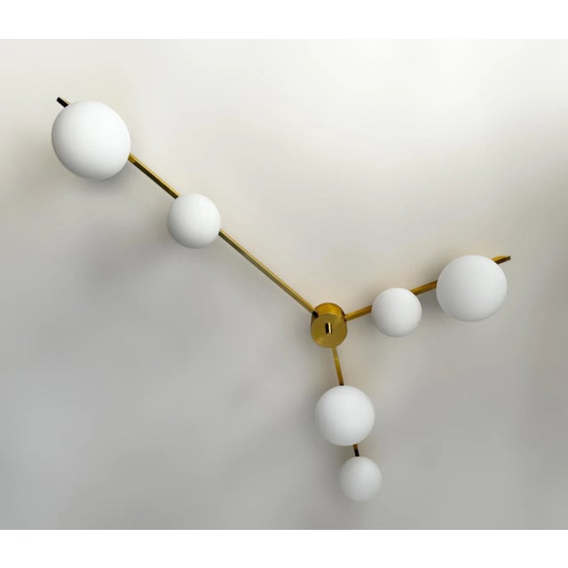 Italian midcentury flush mount with 6 matte white Murano glass globes mounted on solid brass frame in lacquered polished...