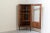 Display case with a door and angled structure to occupy a corner, on three solid legs. Door with original key and a glass...