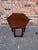 This hexagonal side table is very interesting. a tall, slim piece. at its smallest width, 21" and it's largest (point to...