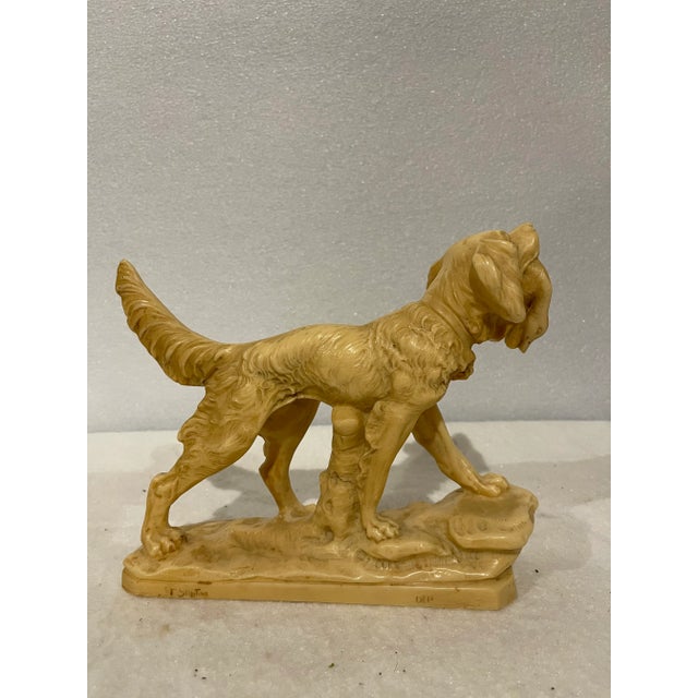 Mid century Italian reconstituted marble statue of a hunting hound with a duck, A Santini. A great addition to a table or...