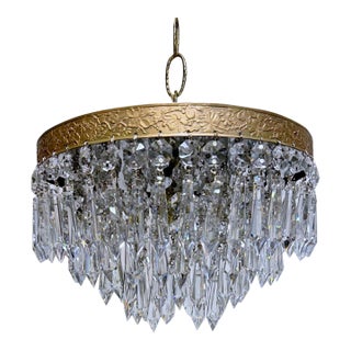 Vintage Hollywood Regency Floral Embossed Brass Tiered Waterfall Crystal Flush Mount Chandelier For Sale