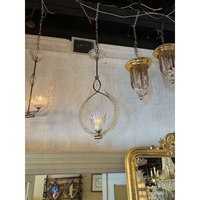 Vintage Italian Murano glass and brass pendant after Barovier & Toso. The chandelier has been professionally rewired,...