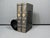 A striking vintage mid-century bookend crafted from black enameled rolled steel. Made in England, this single bookend has...