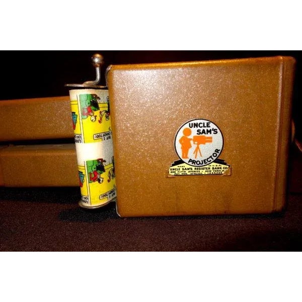 Brown 1930s Uncle Sam’s Hand Crank Movie Film Strip Projector With Vintage Color Film Strip Roll For Sale - Image 8 of 10