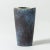 Stoneware vase in a clean form by Gunnar Nylund, the undulating rim softens the form. Vivacious blue glaze with purple...