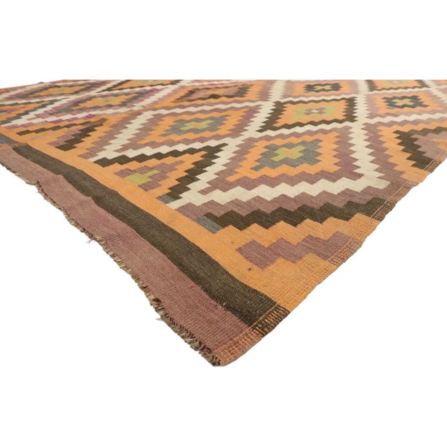 , semi-antique Turkish Kilim rug with Southwestern Bohemian style. This handwoven wool antique Turkish Kilim rug features...
