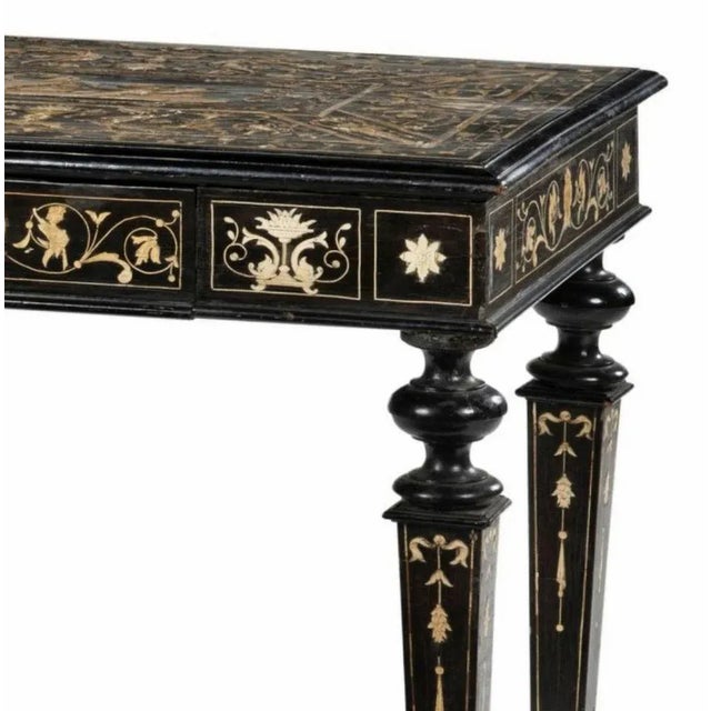 Italian table in ebonized wood and engraved inlays 19th century milan-italy rectangular in shape, opening to a drawer,...