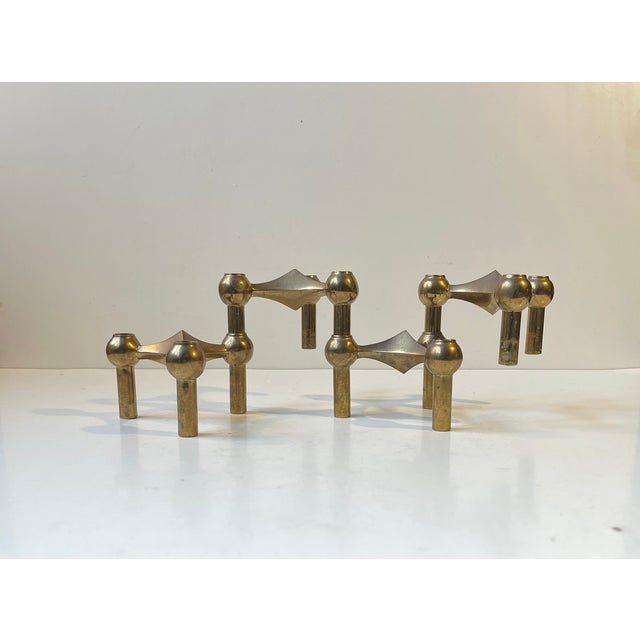 Set of 4 iconic modular candleholders by Frits Nagel and Ceasar Stoffi. Designed in the early 1960s and manufactured by...