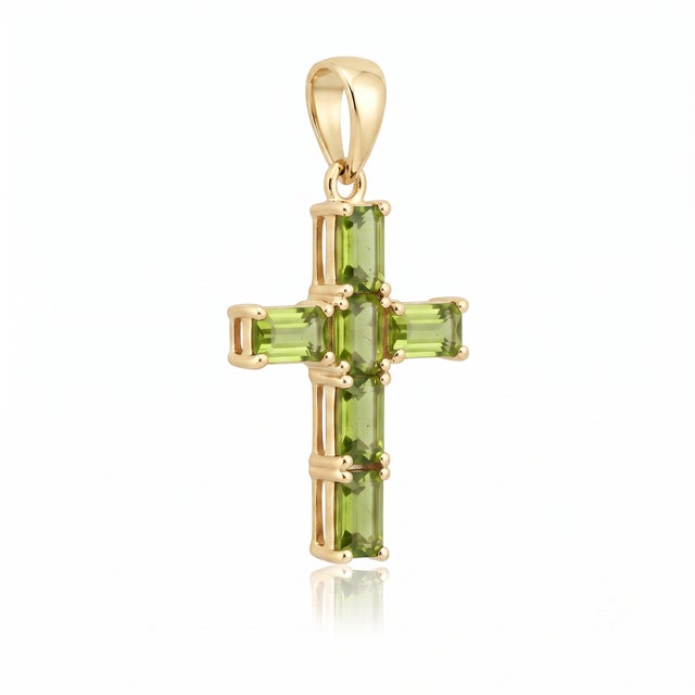 Add a touch of timeless devotion and refreshing color to your jewelry collection with this stunning cross pendant....