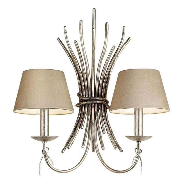 Handmade Forged Iron Wall Light With An Organic Feel In Antique Silver Leaf.