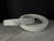 Very decorative pair of interlocking rings of white Carrera marble with pale grey veining. These look great on a cocktail...