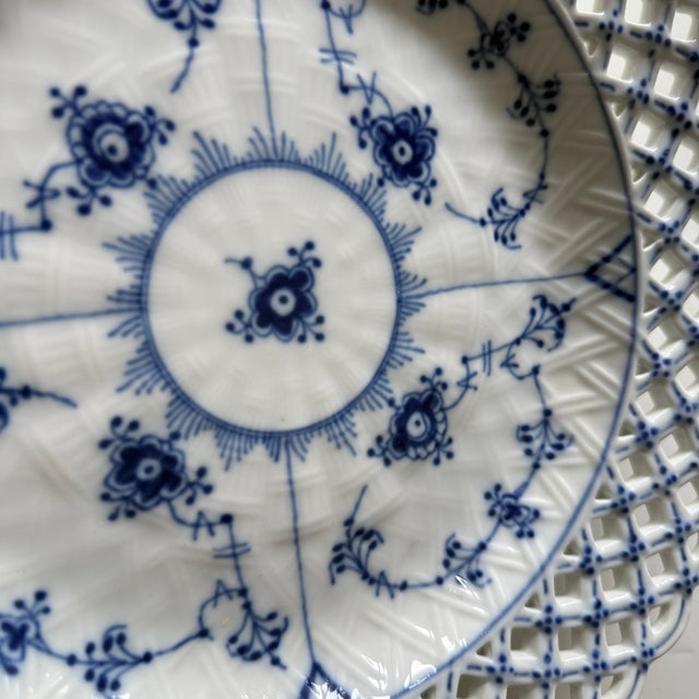 Royal Copenhagen Blue Fluted Full Lace Open Plate in porcelain. Hand-painted in blue. Model number: #1098 Date: 1^985....