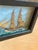This is a charming vintage maritime diorama with classic nautical appeal. Description: Vintage handcrafted sailing ship...