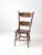 This is an antique pressed back dining chairs. The classic, tall side chair has a decorative pressed design in its back...