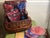 Vintage wicker Picnic Time picnic basket set! The basket has two plaid bows on each corner of the lid and the top of the...