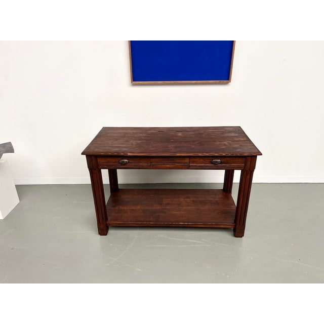 This small drapery table will serve perfectly as a product presentation table in a store or as a server in a kitchen....