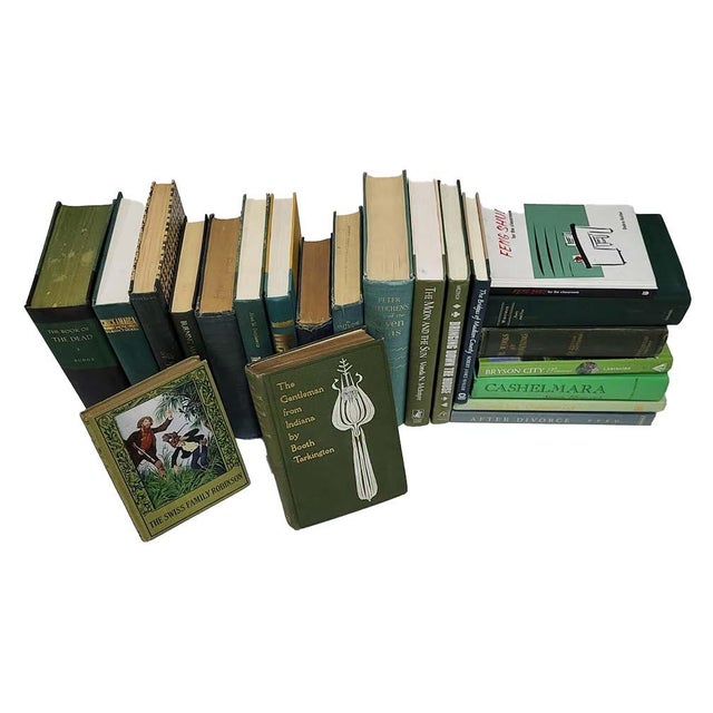 Curated collection of 22 antique and vintage hardcover books, featuring a predominantly green and gold color scheme for...