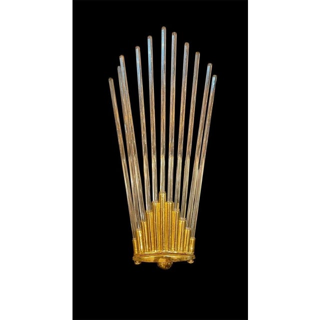 Exceptional G Sciolari wall lighting with tube Murano glass with gilded gold structure. The design and the quality of the...