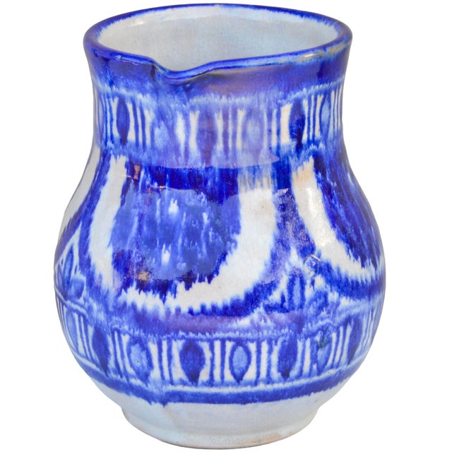 Beautiful one-of-a-kind antique Moroccan ceramic pitcher meticulously handcrafted and glazed in an ornate curved...