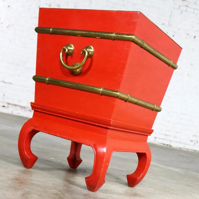 Handsome Chinese red lacquer and brass ice chest, planter, accent table with galvanized insert and lid on hoof foot style...