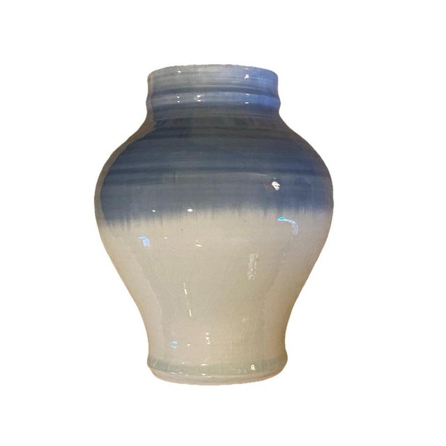 This vintage glazed studio pottery vase is a beautiful addition to any collection. The vase measures 9 inches by 3.5...