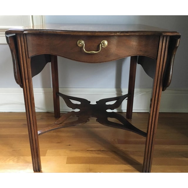 Pembroke drop-leaf table was a wedding present 50 years ago. Wear and tear from its age but beautiful piece.(pictures show...