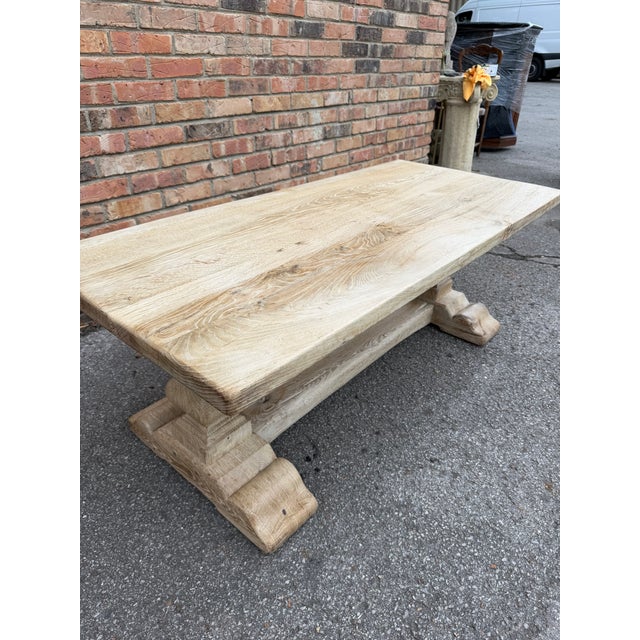 This is a lovely example of a scrubbed oak coffee table. This table is a very solid piece with thick board top and sturdy...