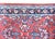 A wonderful mid-20th century Persian Sarouk runner with a repeated mirrored floral pattern running across the length of...