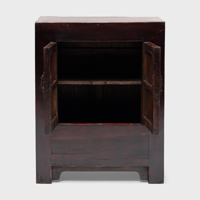 This small Chinese locking cabinet from the late 19th century has a richly aged patina that only time can achieve. The...