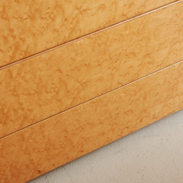 A beautiful birdseye maple wood chest of drawers by Saporiti Italia. This low-profile chest features four spacious...
