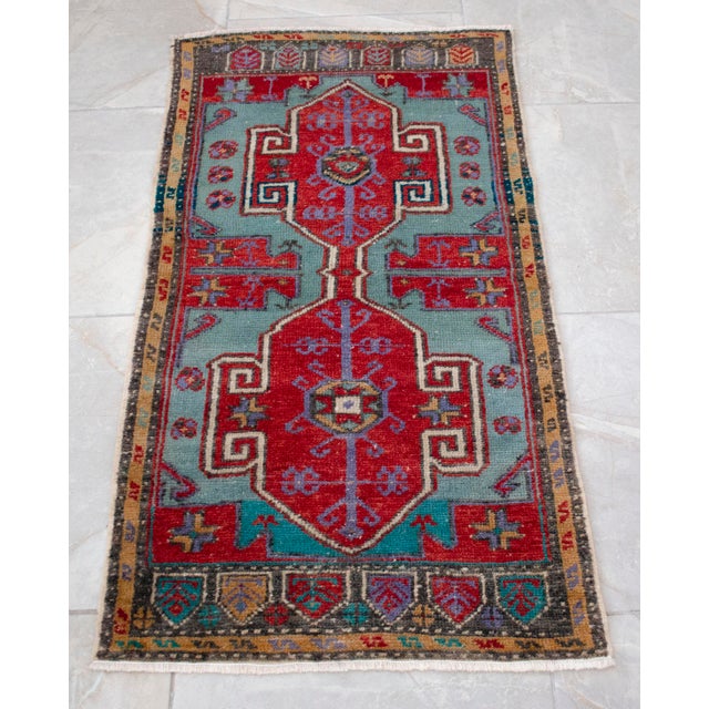 A vintage Turkish small yastik rug, dark grayish green-cyan color background yastik rug perfect for entryway, bath or in...
