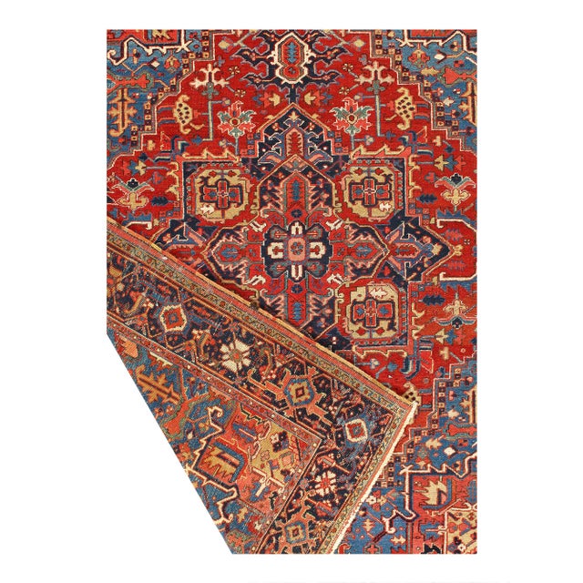 The graceful lines and beautiful rug colors of this antique Persian Heriz Serapi rug evoke the feeling of strolling...