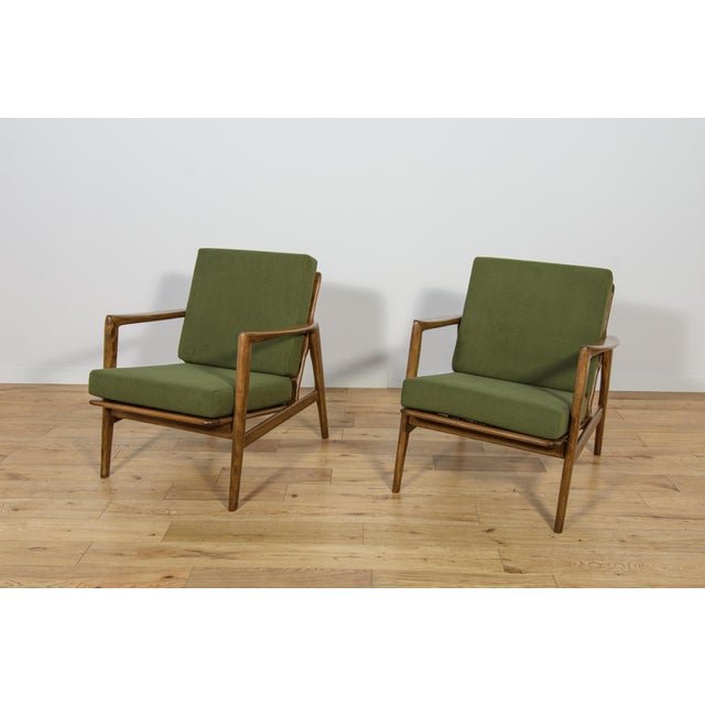This pair of armchairs was produced by the Polish company Swarzędzka Furniture Factory in 60s. The armchairs have new...