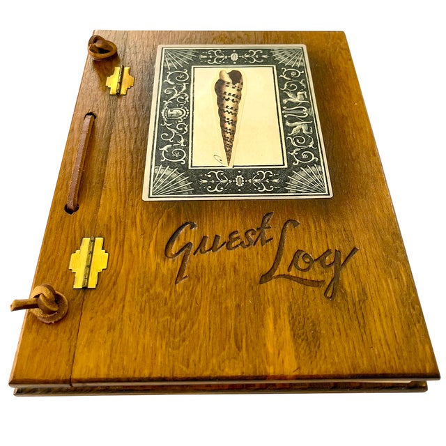 A wonderfully handcrafted vintage wooden guest book that evokes the charm of a coastal inn, seaside cottage, or historic...