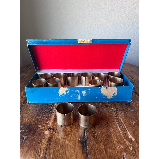 Vintage Brass Napkin Rings Set of 12 1.5” diameter and 1.25” height each napkin ring Scratches, fading, tarnish present in...