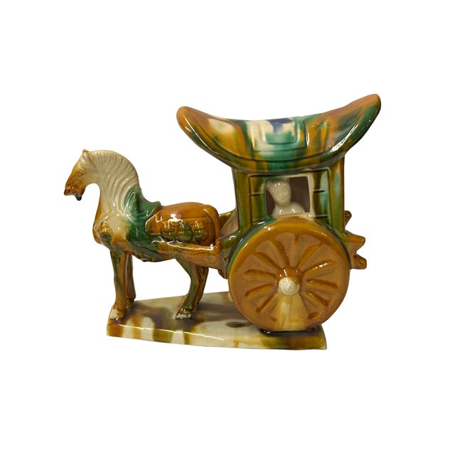 Journey back in time with the Ancient-Style Sancai Glaze Ceramic Horse and Carriage Figurine—a stunning representation of...
