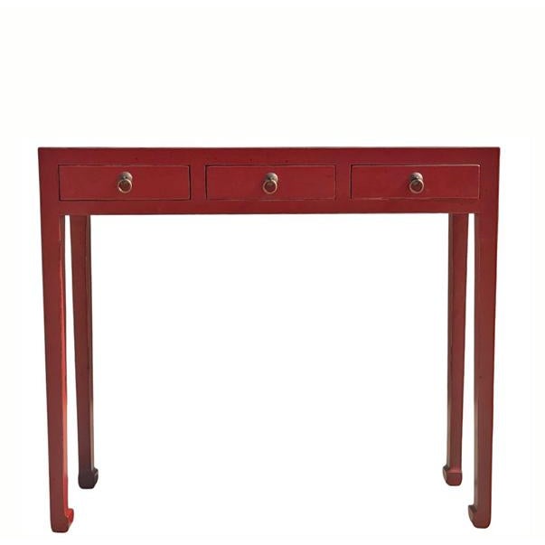 This antique slender wooden console table features a vibrant red lacquer finish. It is built with three side-by-side...