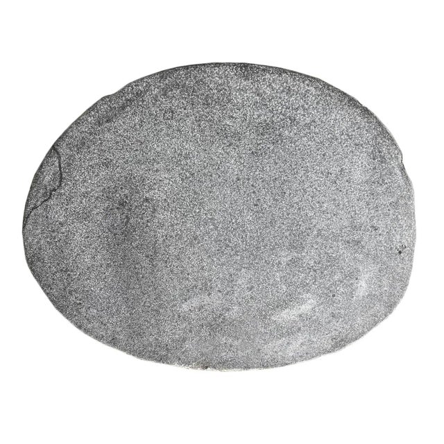 Solid heavy stone boulder vintage outdoor side table or stool. This rustic organic modern piece will look beautiful and...