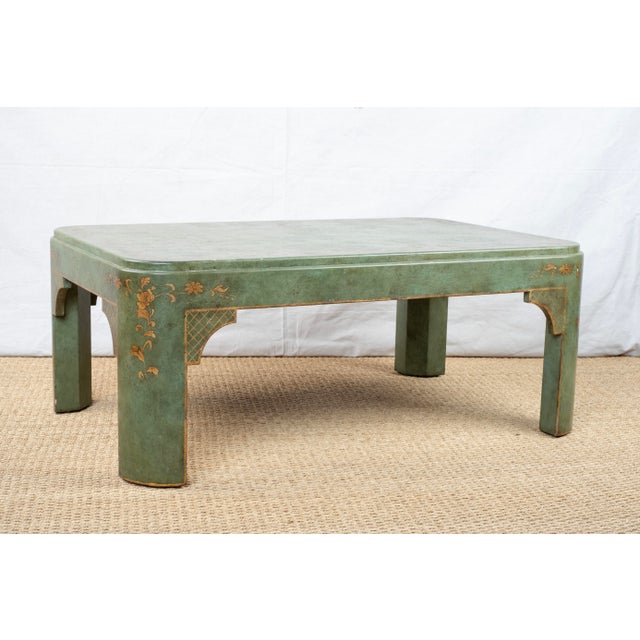 A hand painted coffee table, of recent manufacture, custom made in the USA. Hand painted green with an antique finish and...