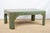 A hand painted coffee table, of recent manufacture, custom made in the USA. Hand painted green with an antique finish and...
