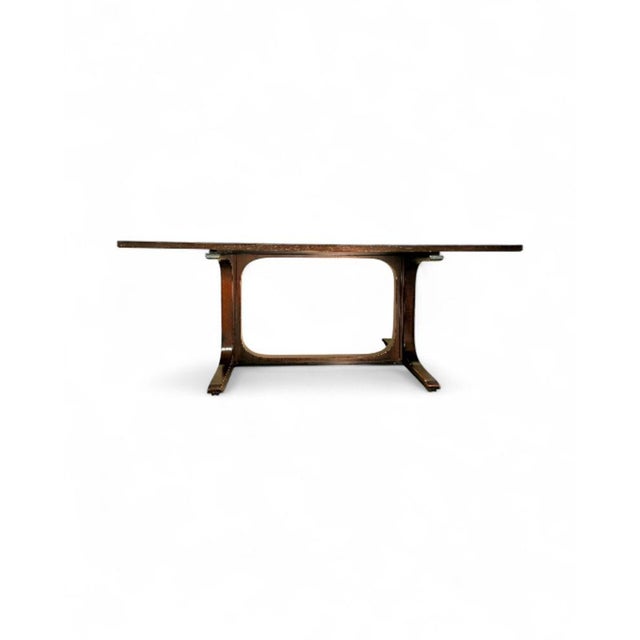 The "SP" table, designed by Giovanni Ausenda for Stilwood in Italy in the 1960s, is a refined example of mid-century...