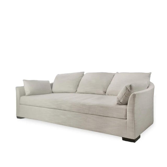 The Holly Hunt Champagne Villa Sofa offers refined comfort with its tailored silhouette, textured woven upholstery in a...