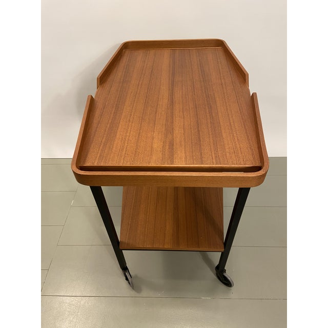 Attractive teak serving trolley, 2 tiers with bentwood details and metal legs