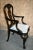 Vintage Ornate Chair has a Queen Anne Georgian Style. Ornate. Carved Mahogany. Paw Feet. Shell Motif. The finish is a very...